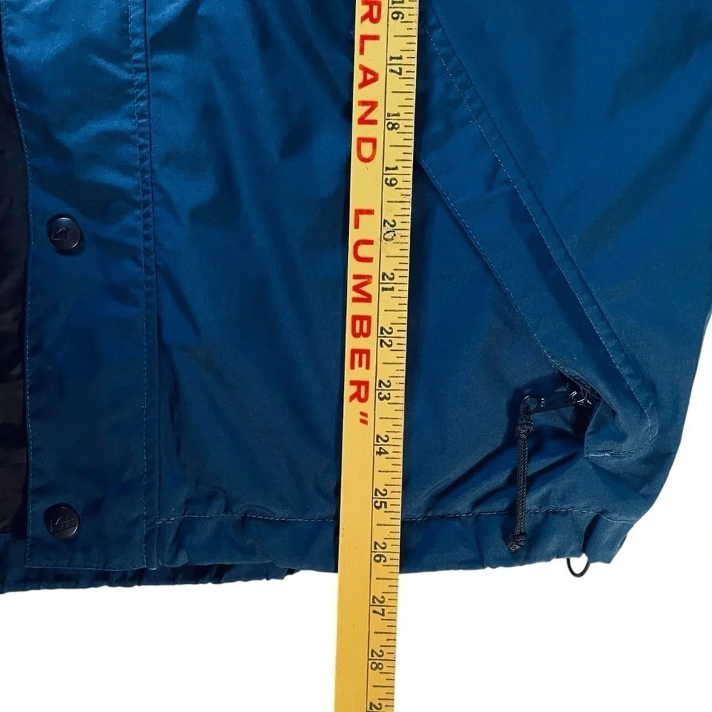 REI Men’s jacket size medium midnight, blue hidden hood